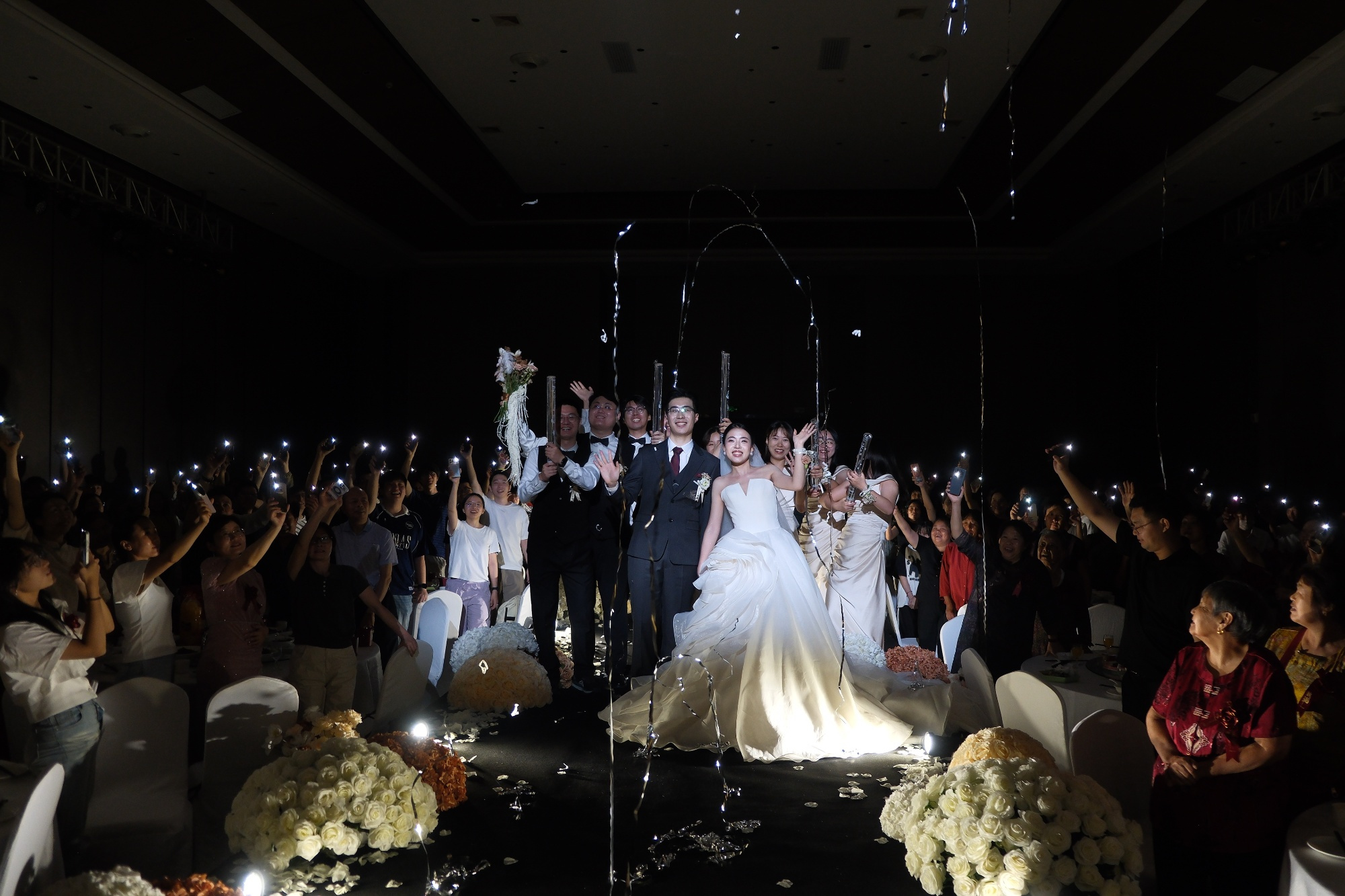 The newlyweds celebrating together among their guests